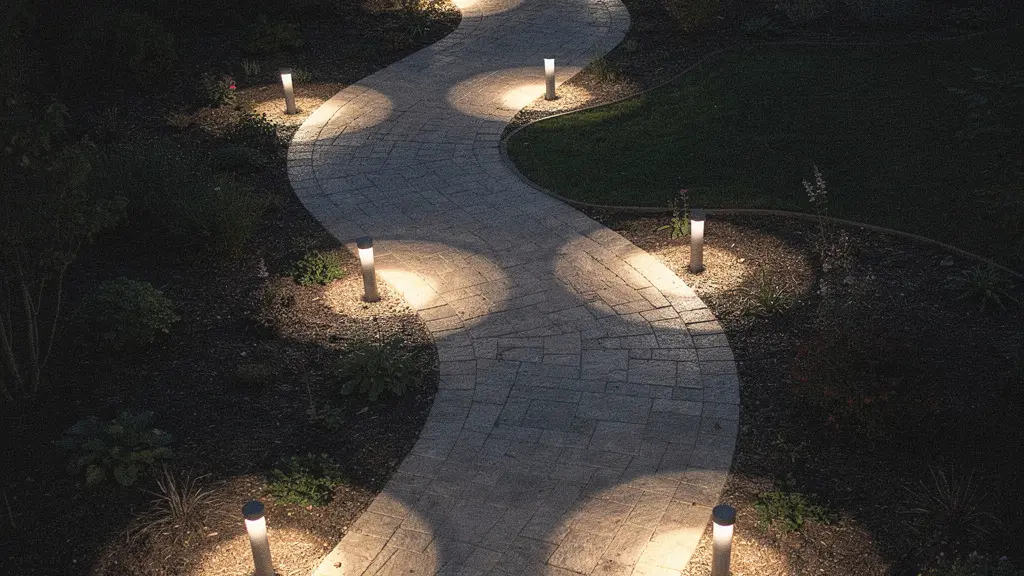 Aerial view showing overlapping light patterns from bollards creating continuous illumination